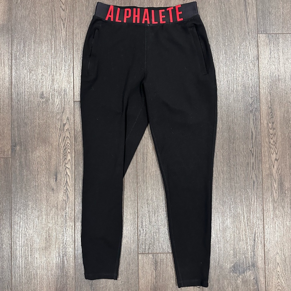 Alphalete Woman’s Black Leggings with Red Accents Size Small